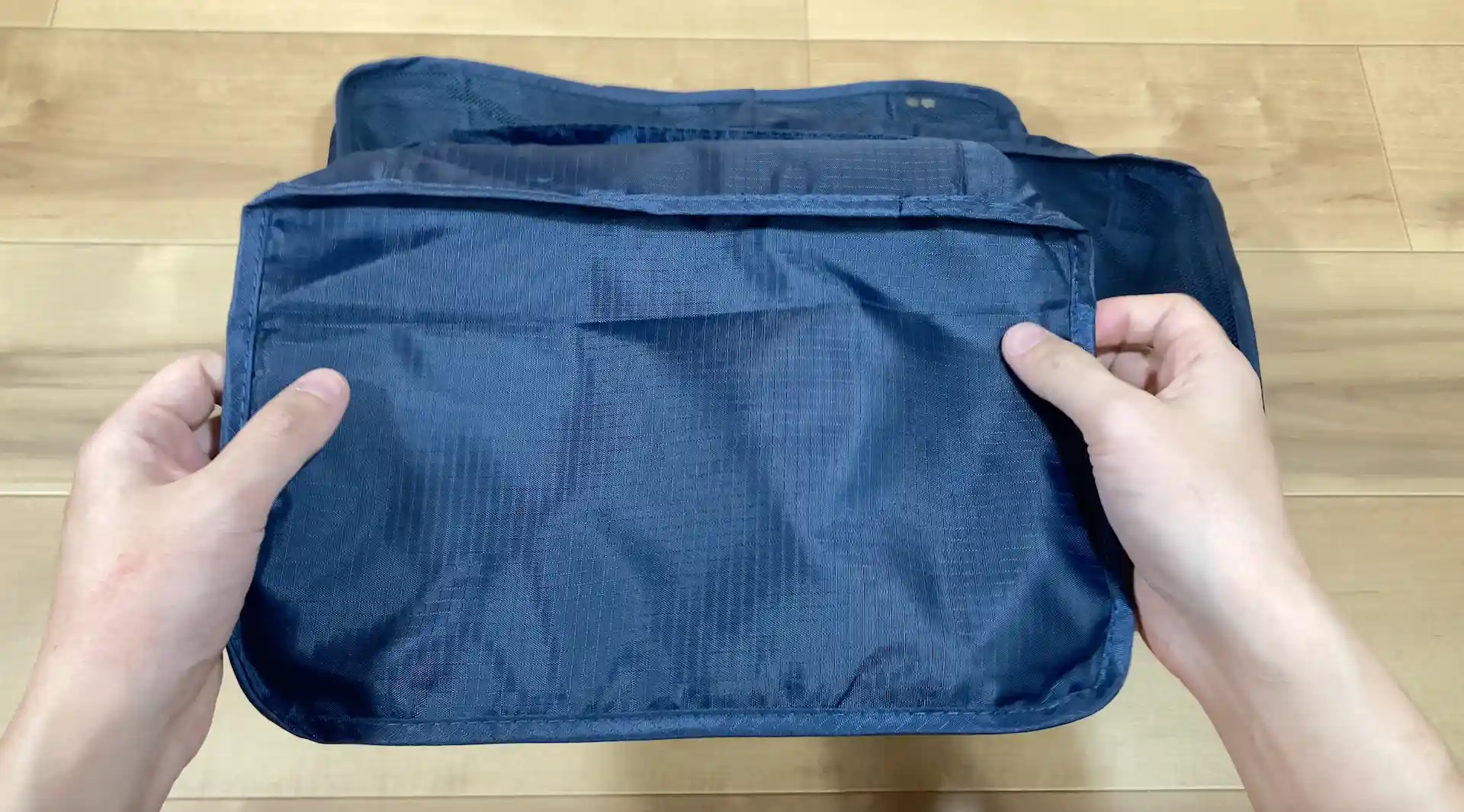 ダイソーのトラベル収納ケースセットに含まれていたメッシュケースの裏面