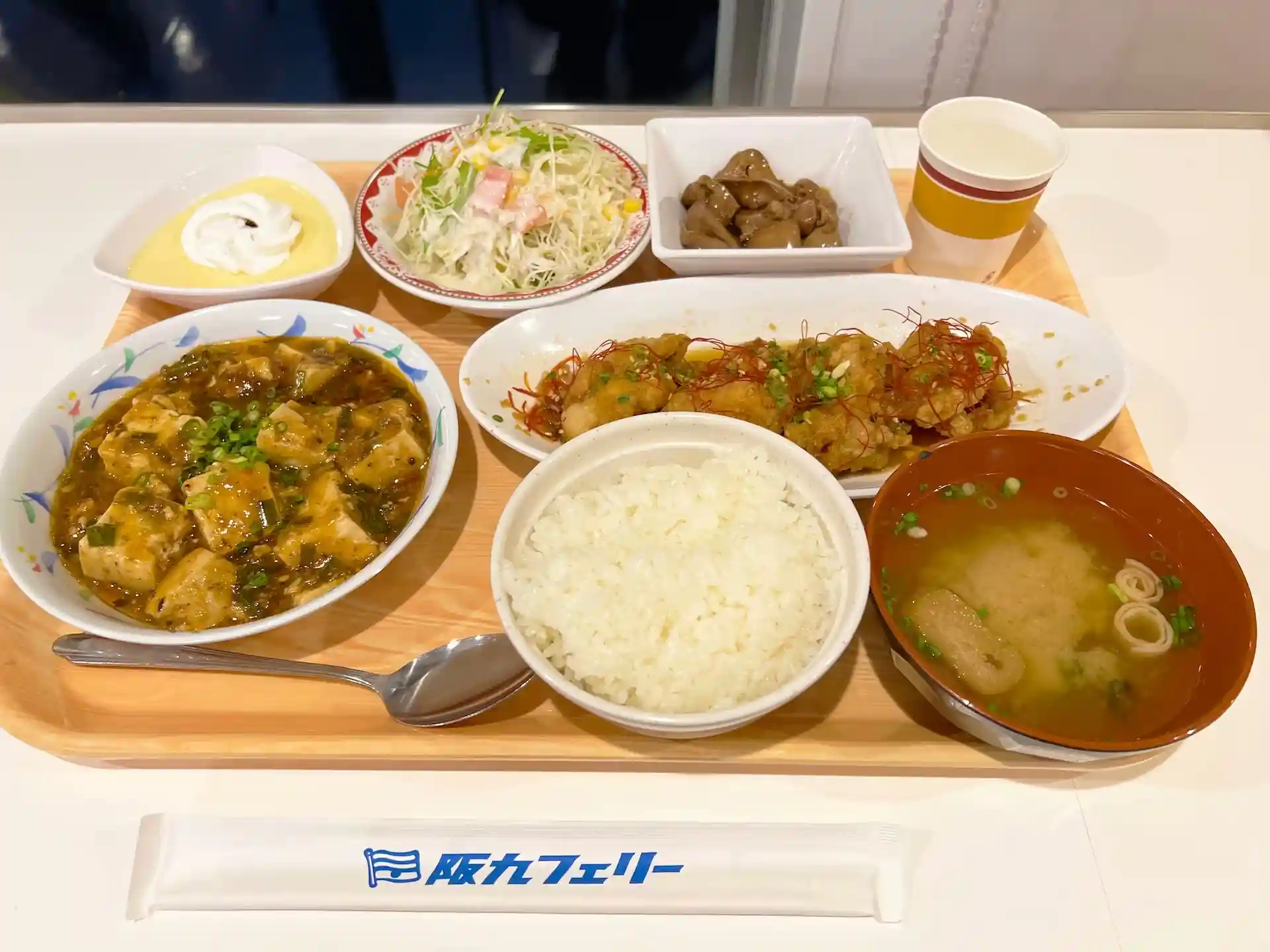 Plate of dinner offerings at the Hankyu Ferry SETTSU Restaurant