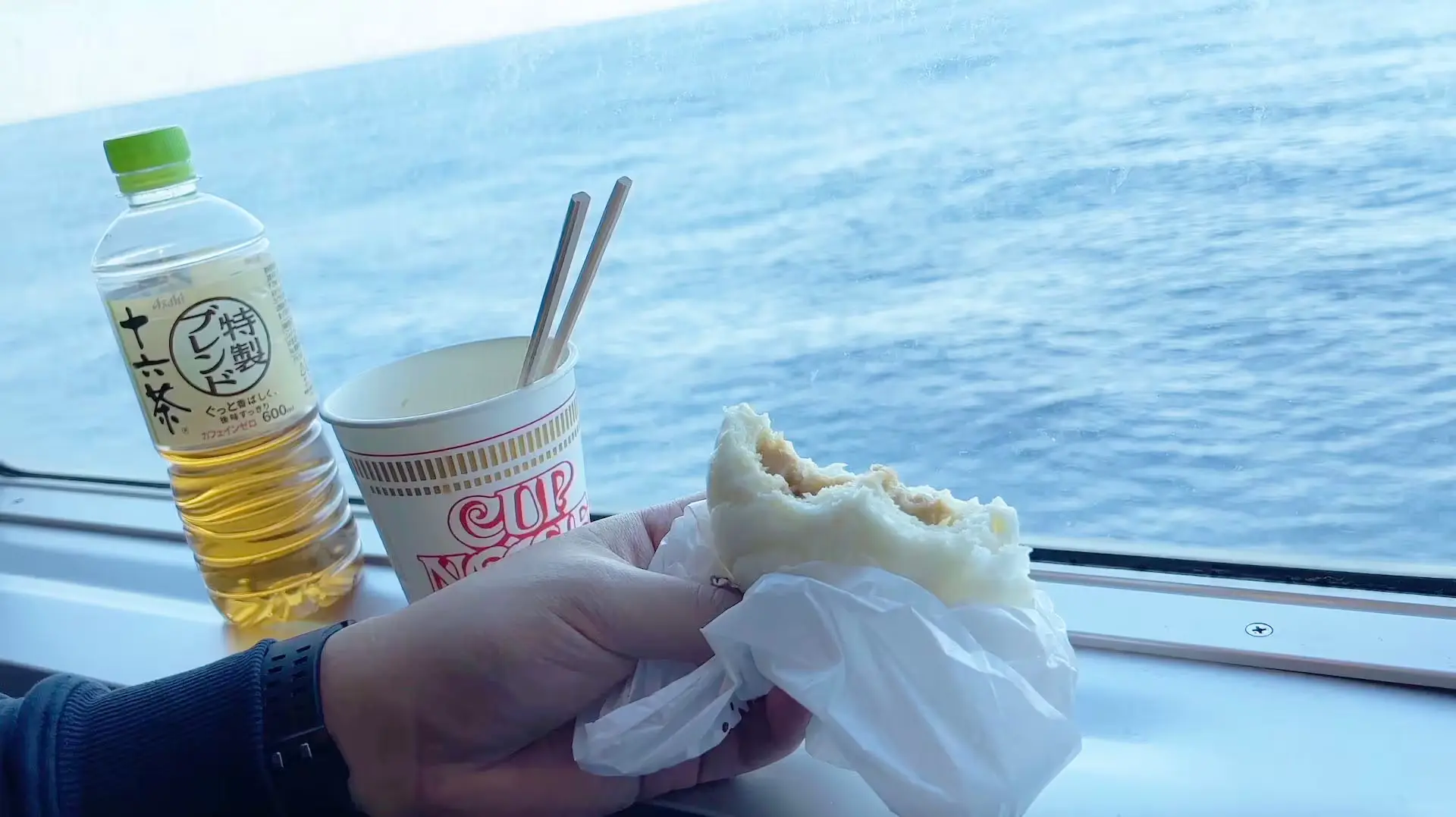 Eating cup noodles purchased on board the Oki Kisen Ferry in a special cabin